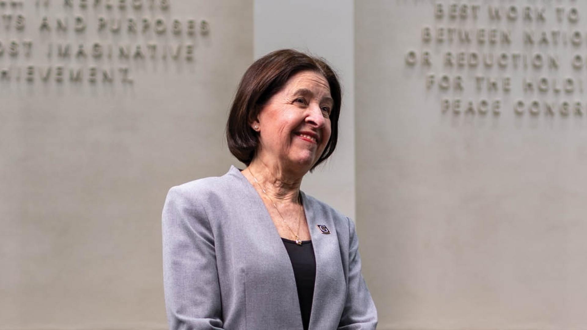 Gustavus Adolphus College President Rebecca Bergman in the Nobel Hall of Science looks to the future. 