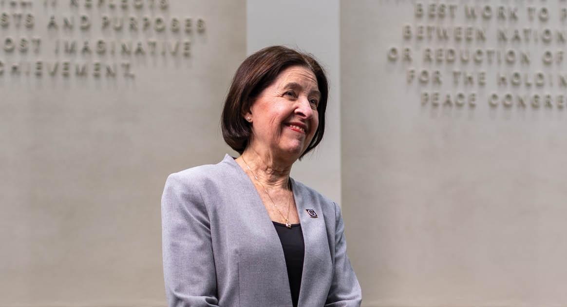 Gustavus Adolphus College President Rebecca Bergman in the Nobel Hall of Science looks to the future. 
