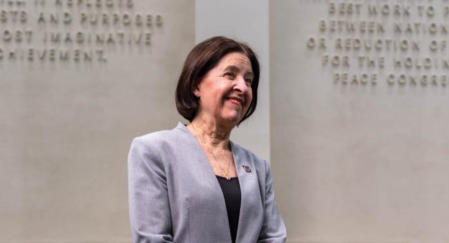 Gustavus Adolphus College President Rebecca Bergman in the Nobel Hall of Science looks to the future. 