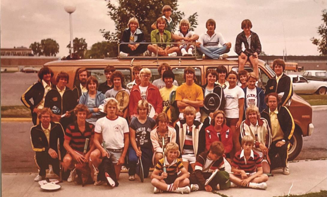 A group of tennis-loving kids by a van in the 1970s. 
